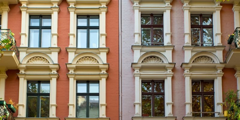 Windows of two rehabilitated townhouses